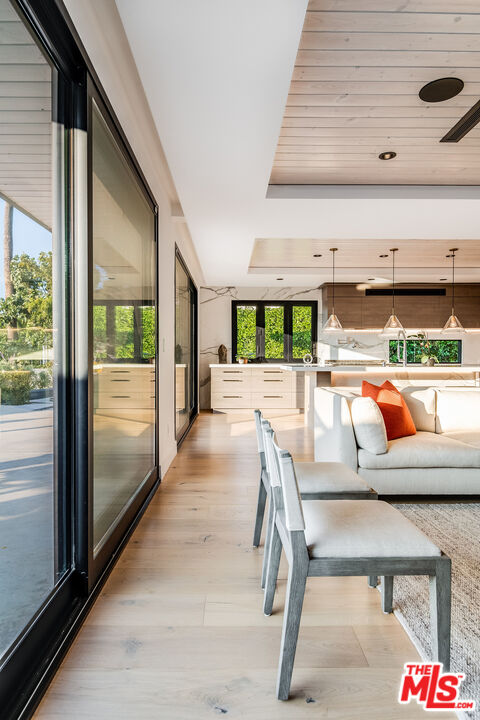 2715 Edwin Place Los Angeles, CA 90046 - Photo 12 of 52 a dining room with furniture and wooden floor