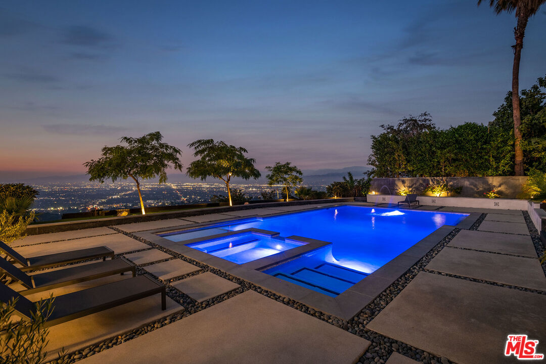 2715 Edwin Place Los Angeles, CA 90046 - Photo 39 of 52 a view of a pool with a patio