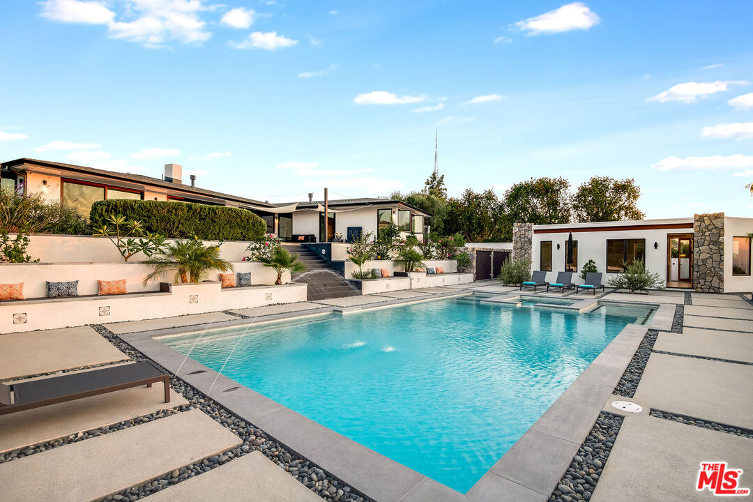 2715 Edwin Place Los Angeles, CA 90046 - Photo 48 of 52 a view of a swimming pool with a patio