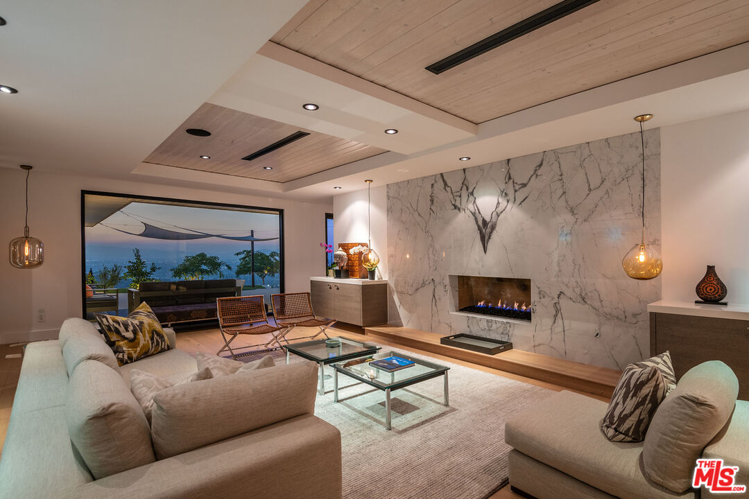2715 Edwin Place Los Angeles, CA 90046 - Photo 9 of 52 a living room with furniture and a flat screen tv