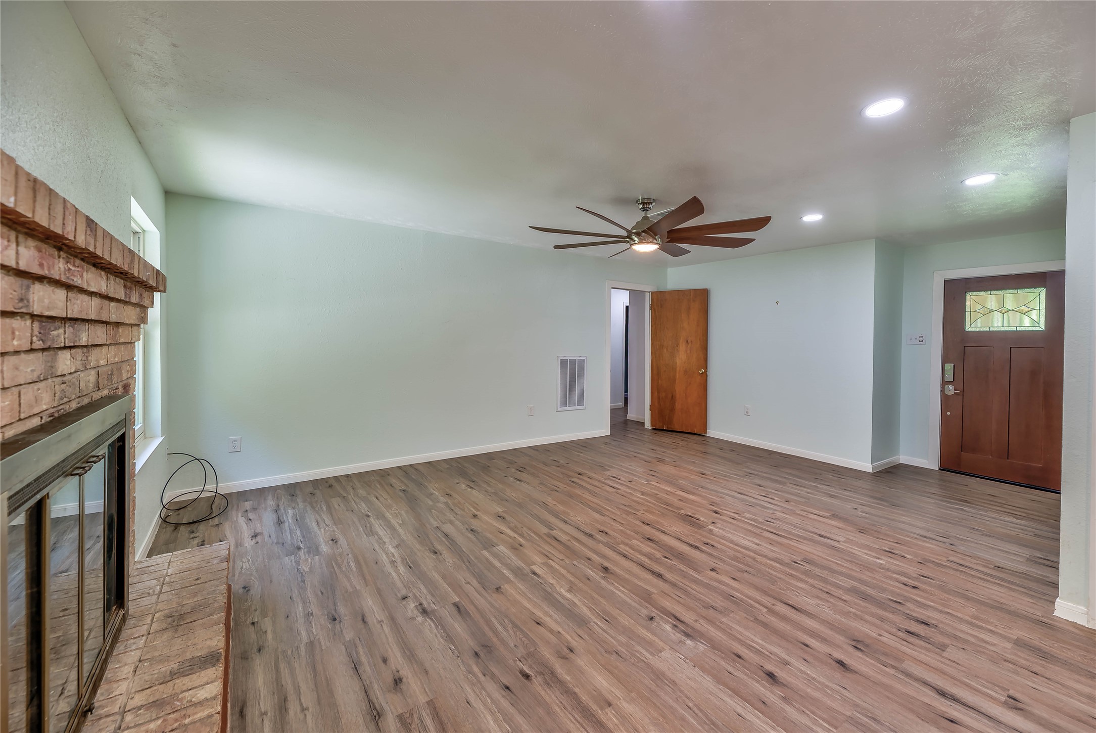 3003 Paul Knox Street Huntsville, TX 77320 - Photo 12 of 46 a view of empty room with wooden floor