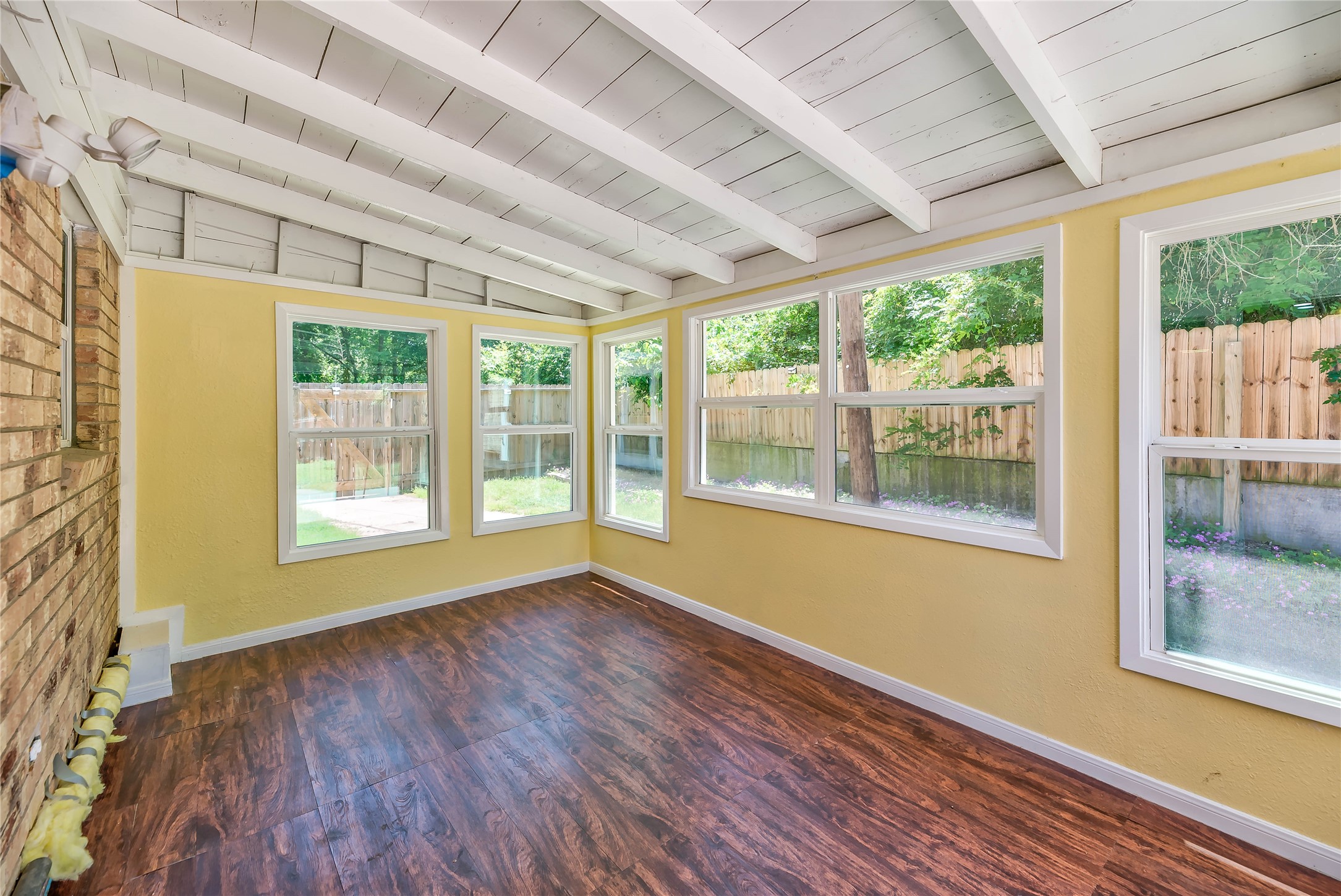 3003 Paul Knox Street Huntsville, TX 77320 - Photo 24 of 46 a view of empty room with wooden floor and fan