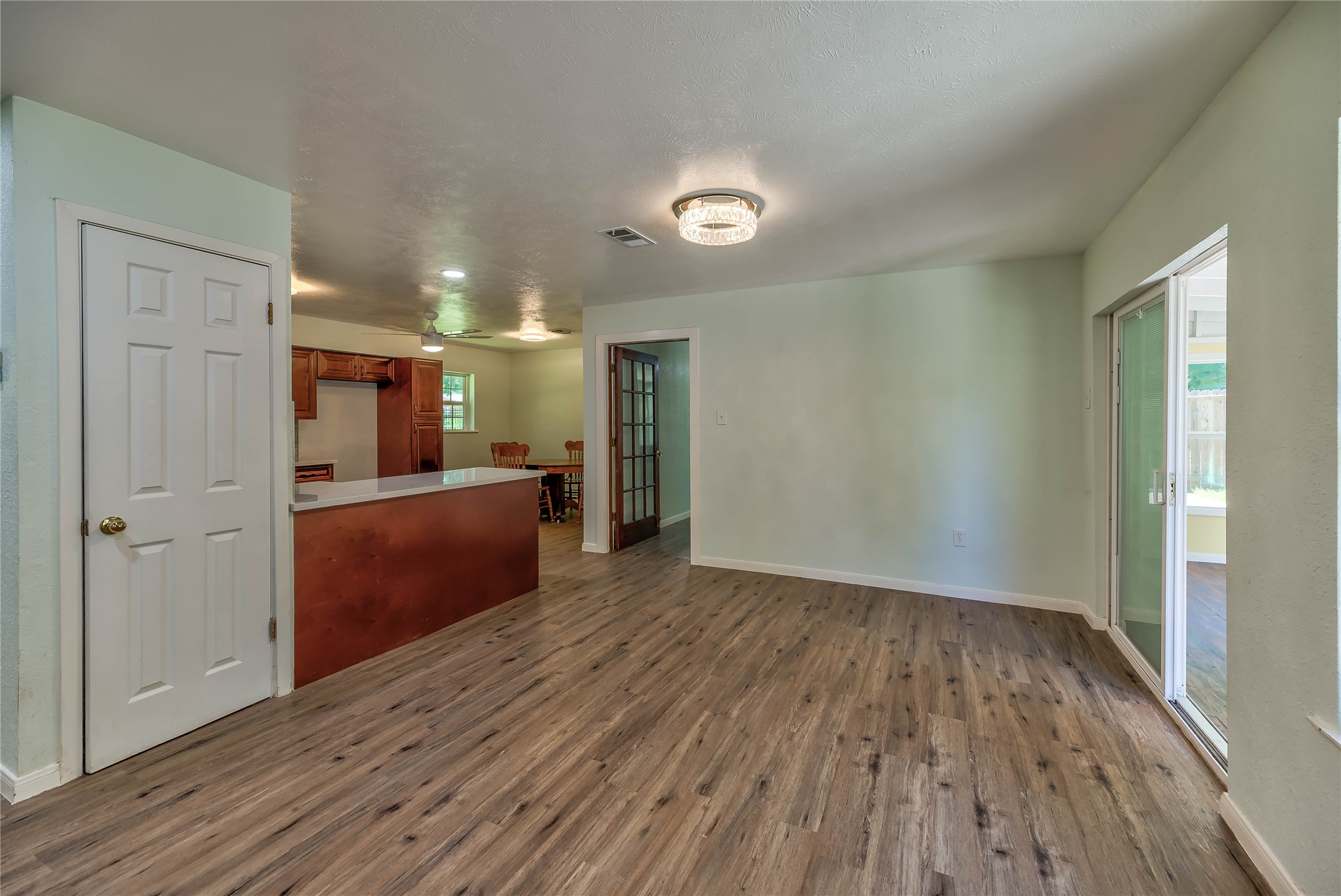 3003 Paul Knox Street Huntsville, TX 77320 - Photo 25 of 46 a view of kitchen and wooden floor