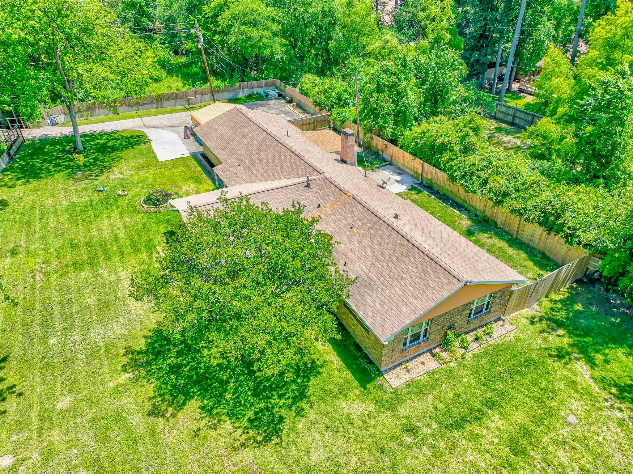 3003 Paul Knox Street Huntsville, TX 77320 - Photo 41 of 46 an aerial view of a house with a backyard