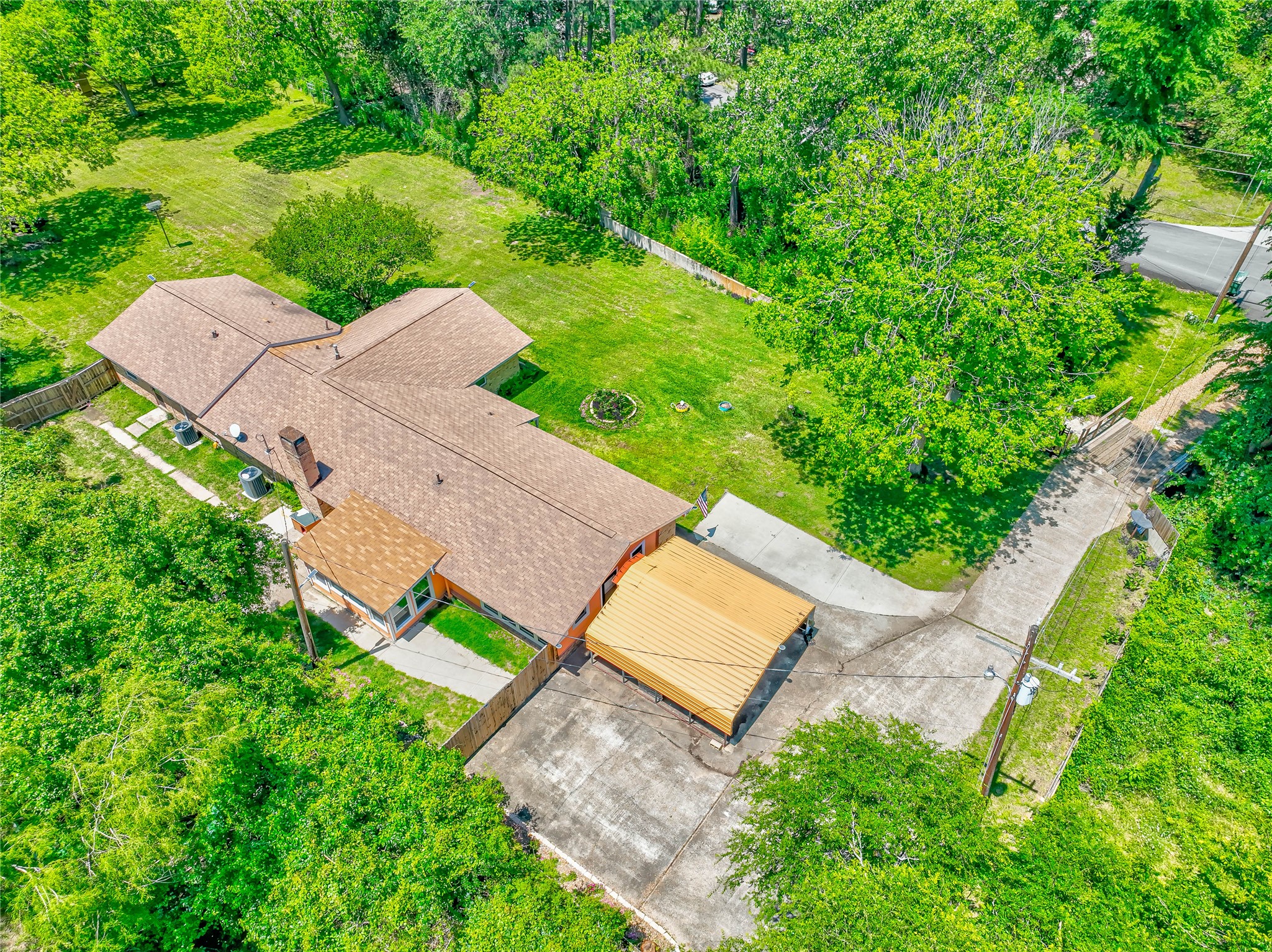 3003 Paul Knox Street Huntsville, TX 77320 - Photo 42 of 46 an aerial view of a house with garden space and street view