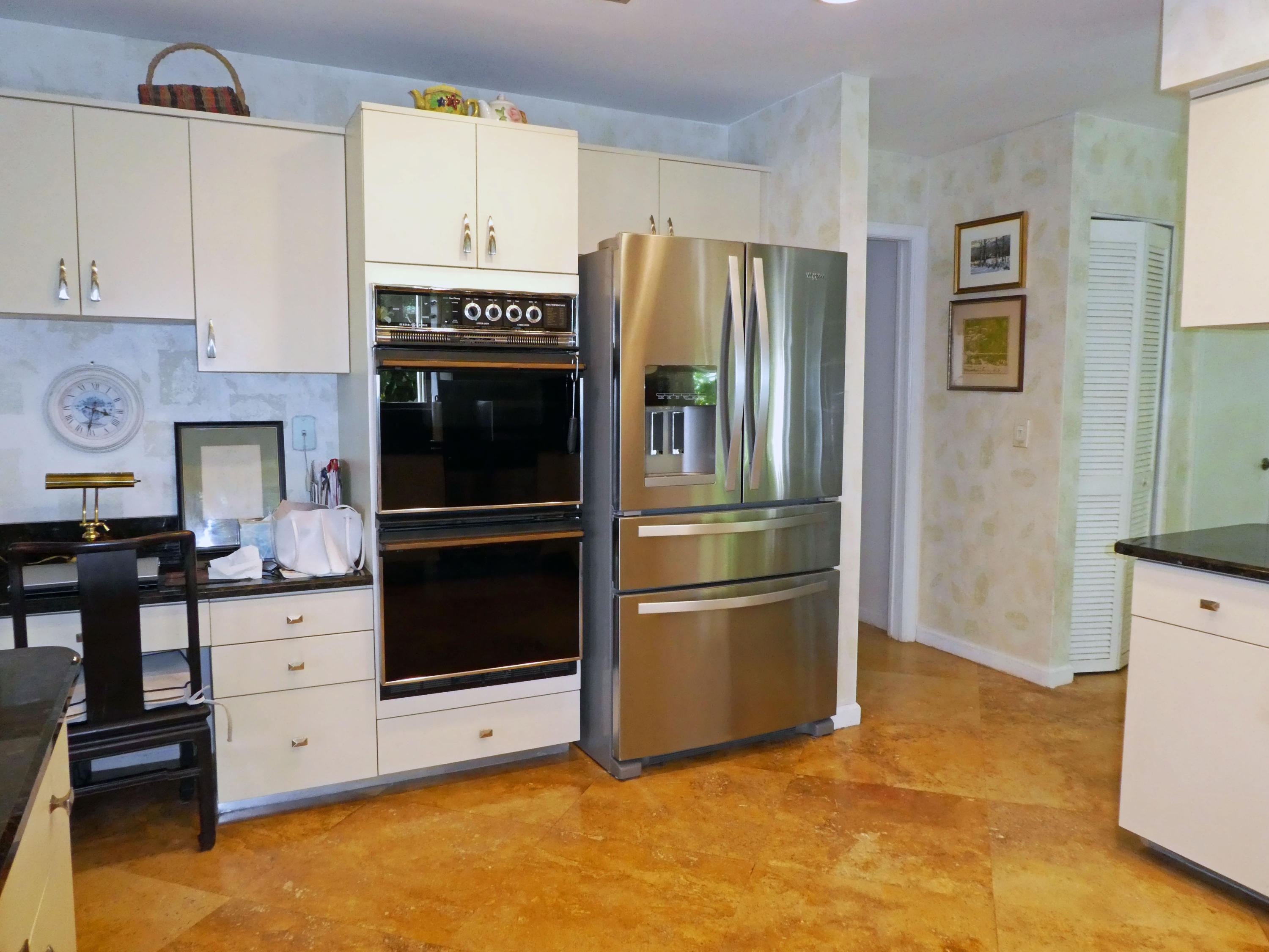 17331 Springtree Lane Boca Raton, FL 33487 - Photo 19 of 60 a kitchen with stainless steel appliances a refrigerator stove and microwave