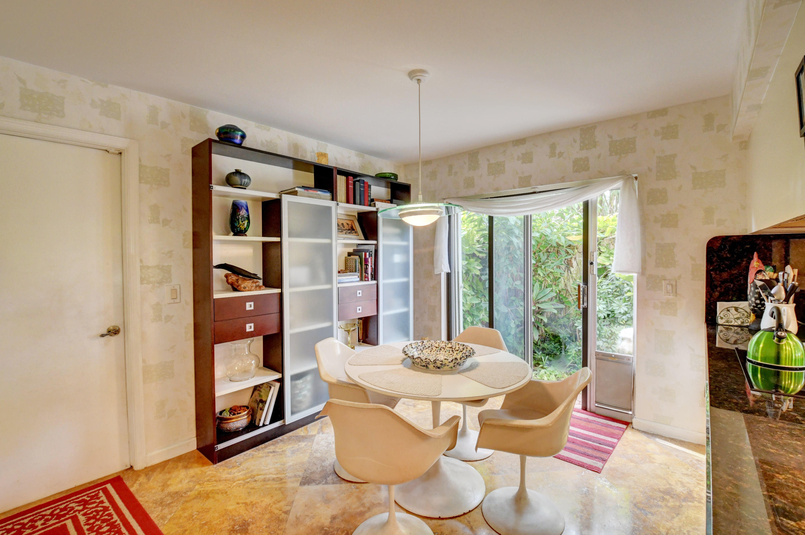 17331 Springtree Lane Boca Raton, FL 33487 - Photo 21 of 60 a dining room with furniture and floor to ceiling window