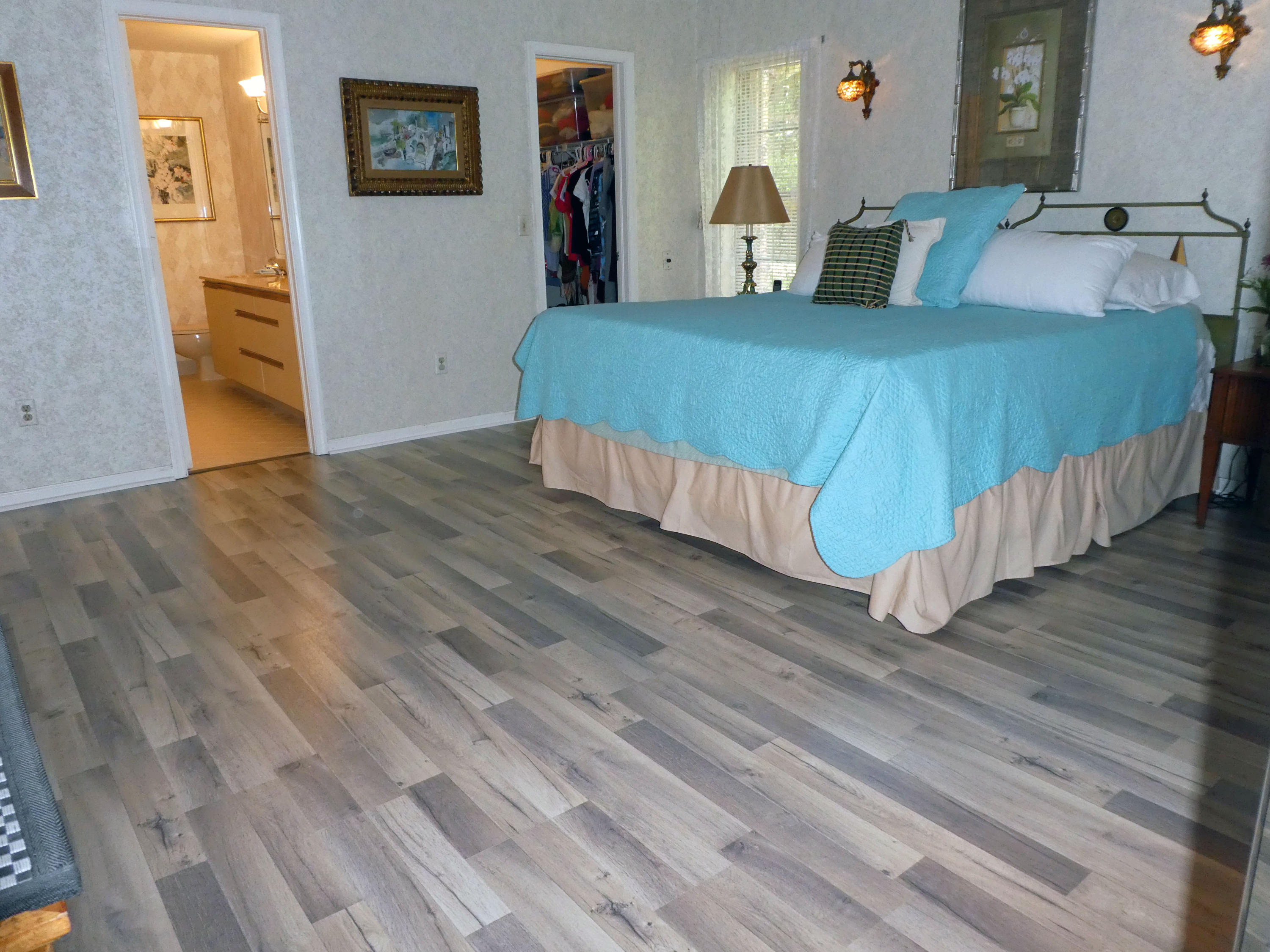 17331 Springtree Lane Boca Raton, FL 33487 - Photo 22 of 60 a bedroom with a bed and painting on the wall