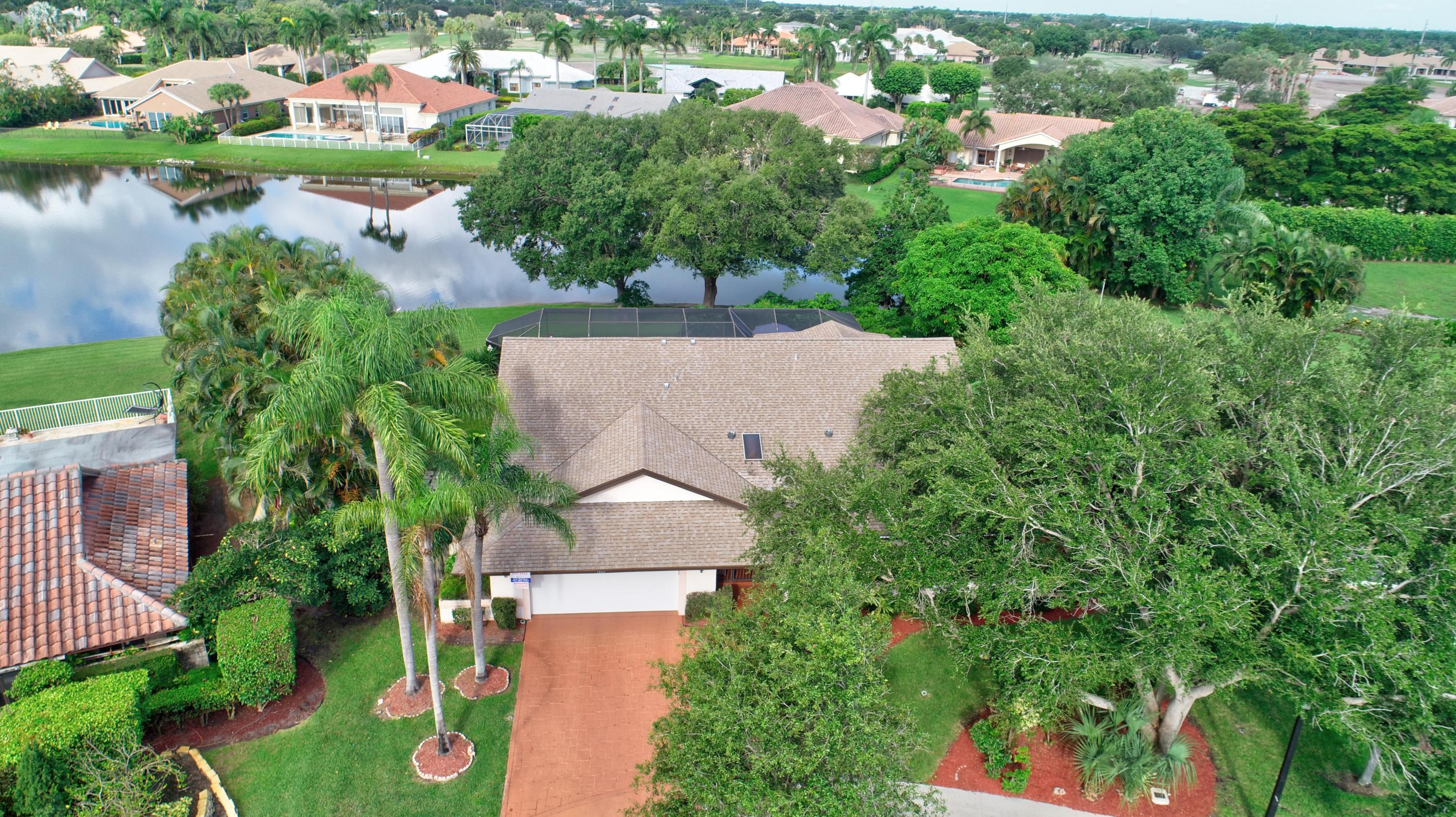 17331 Springtree Lane Boca Raton, FL 33487 - Photo 49 of 60 an aerial view of residential house with outdoor space and lake view