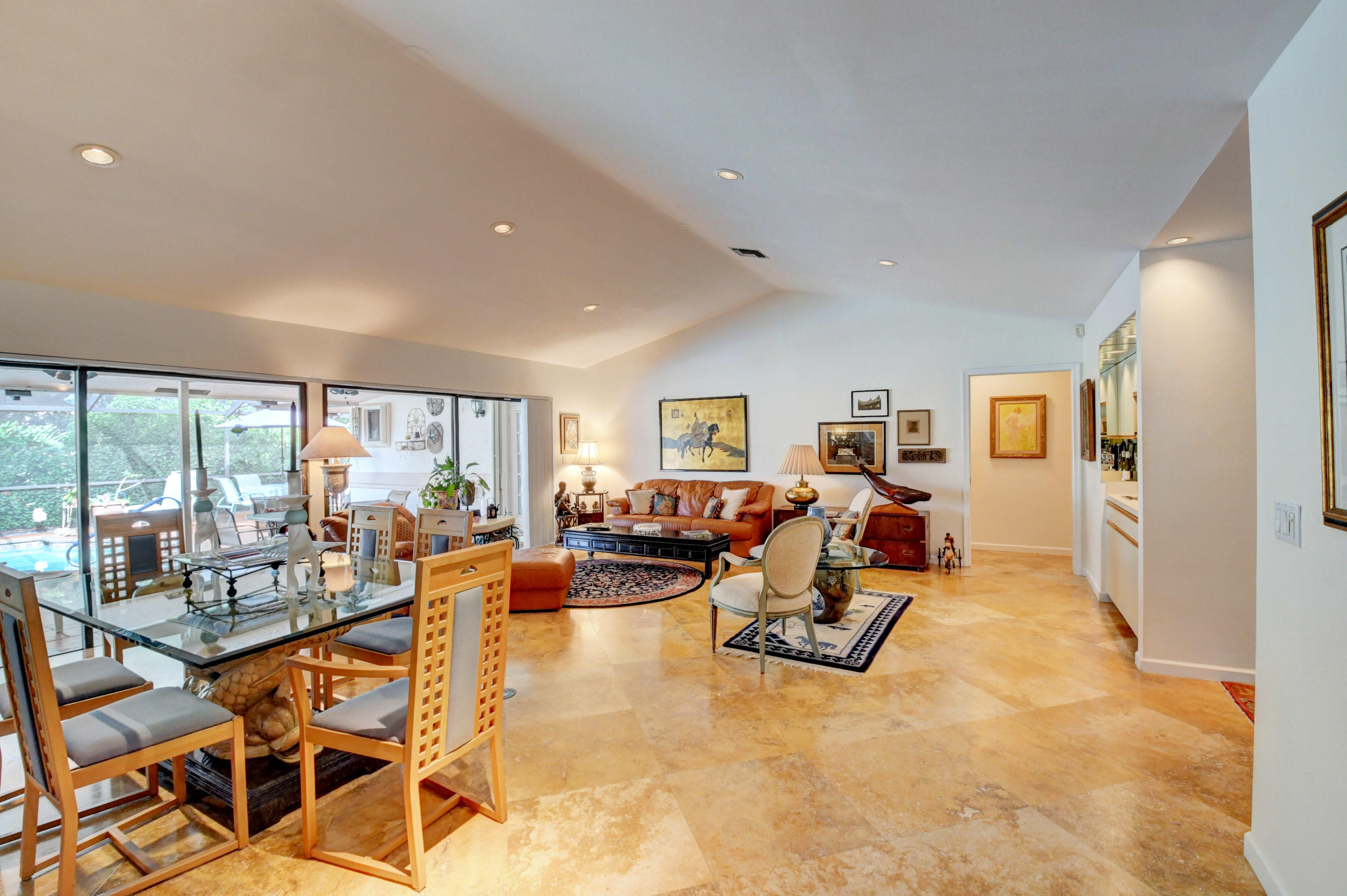 17331 Springtree Lane Boca Raton, FL 33487 - Photo 5 of 60 a living room with furniture and a large window