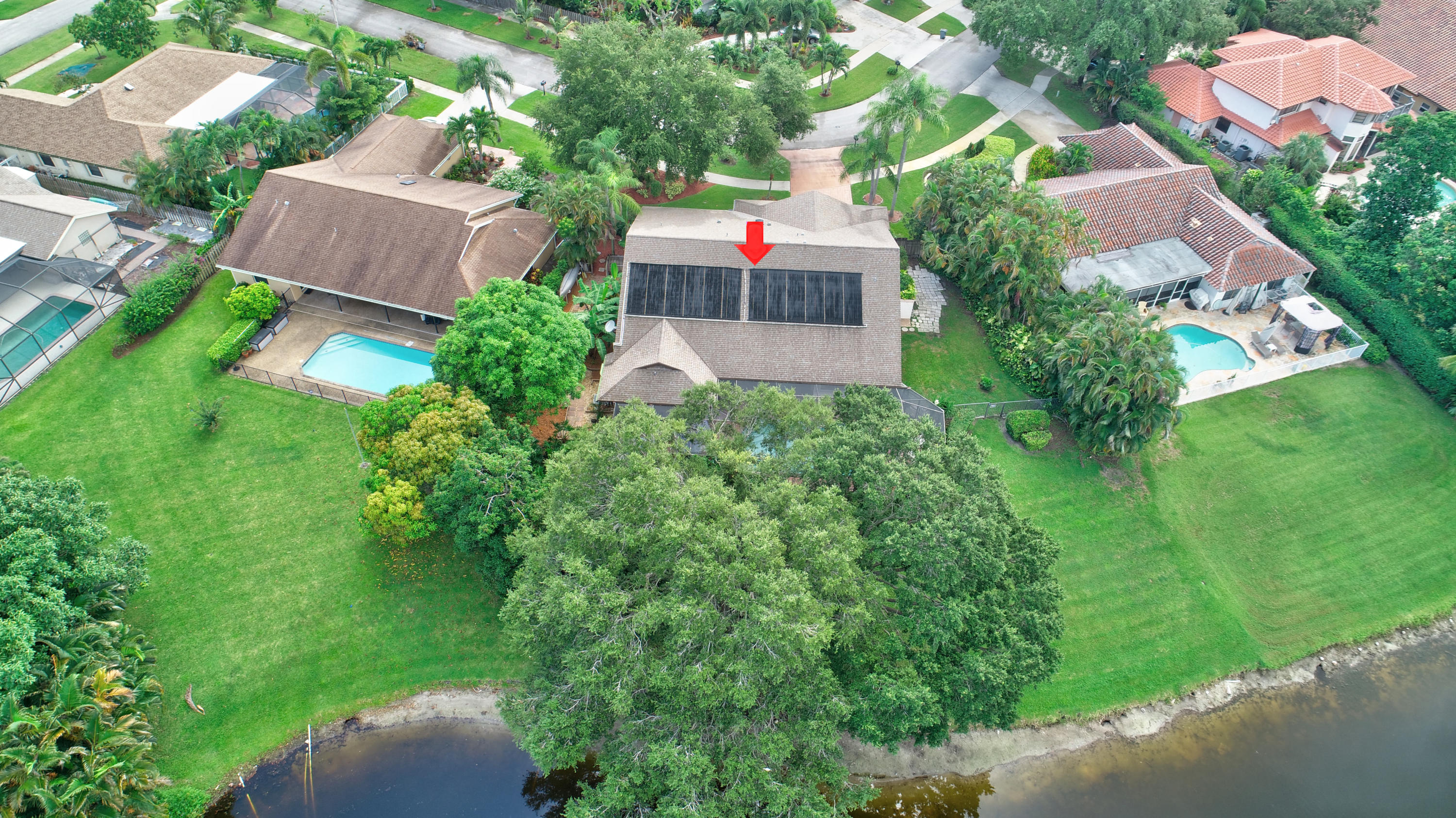 17331 Springtree Lane Boca Raton, FL 33487 - Photo 52 of 60 an aerial view of a house with pool outdoor seating and yard