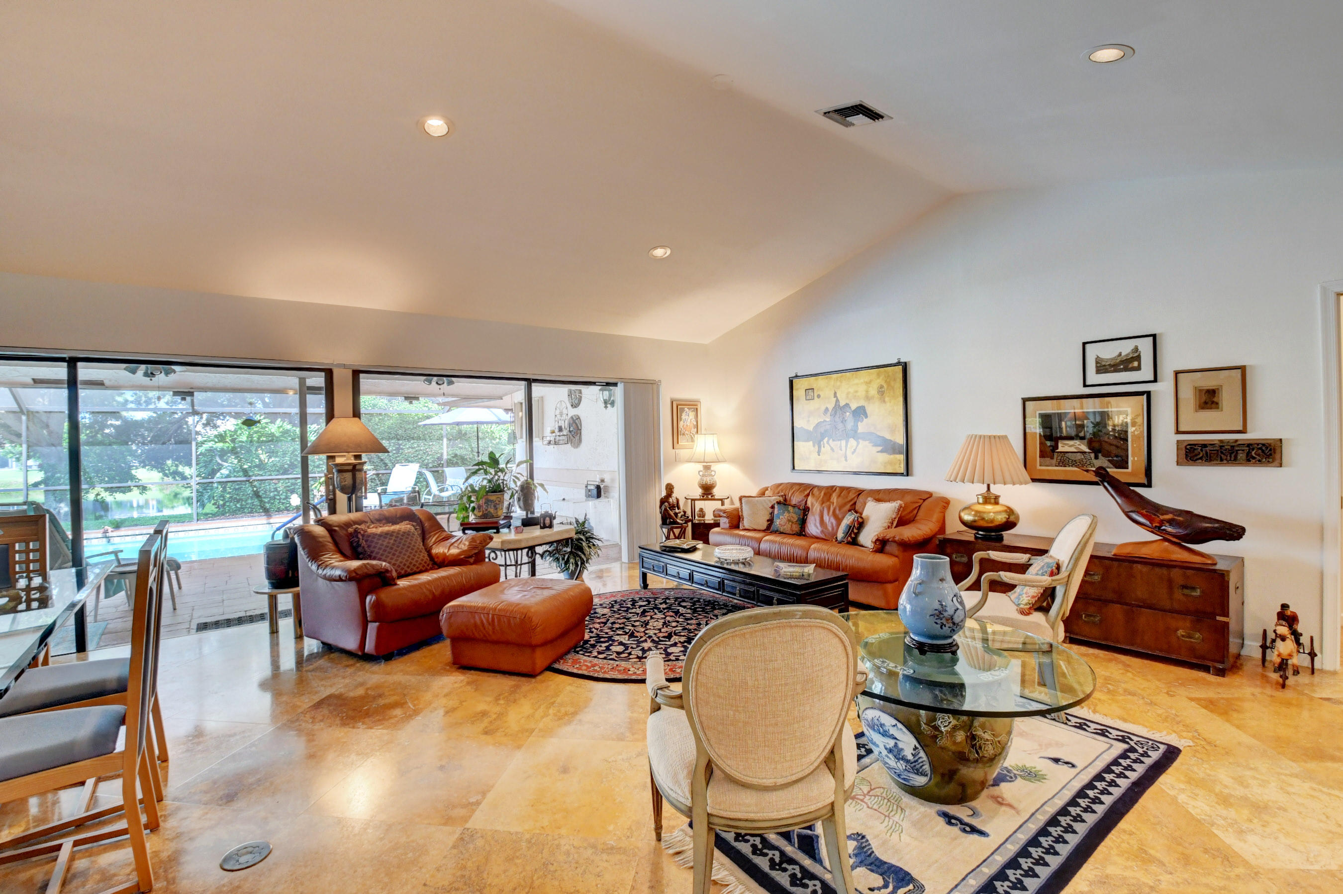 17331 Springtree Lane Boca Raton, FL 33487 - Photo 7 of 60 a living room with fireplace furniture and a large window