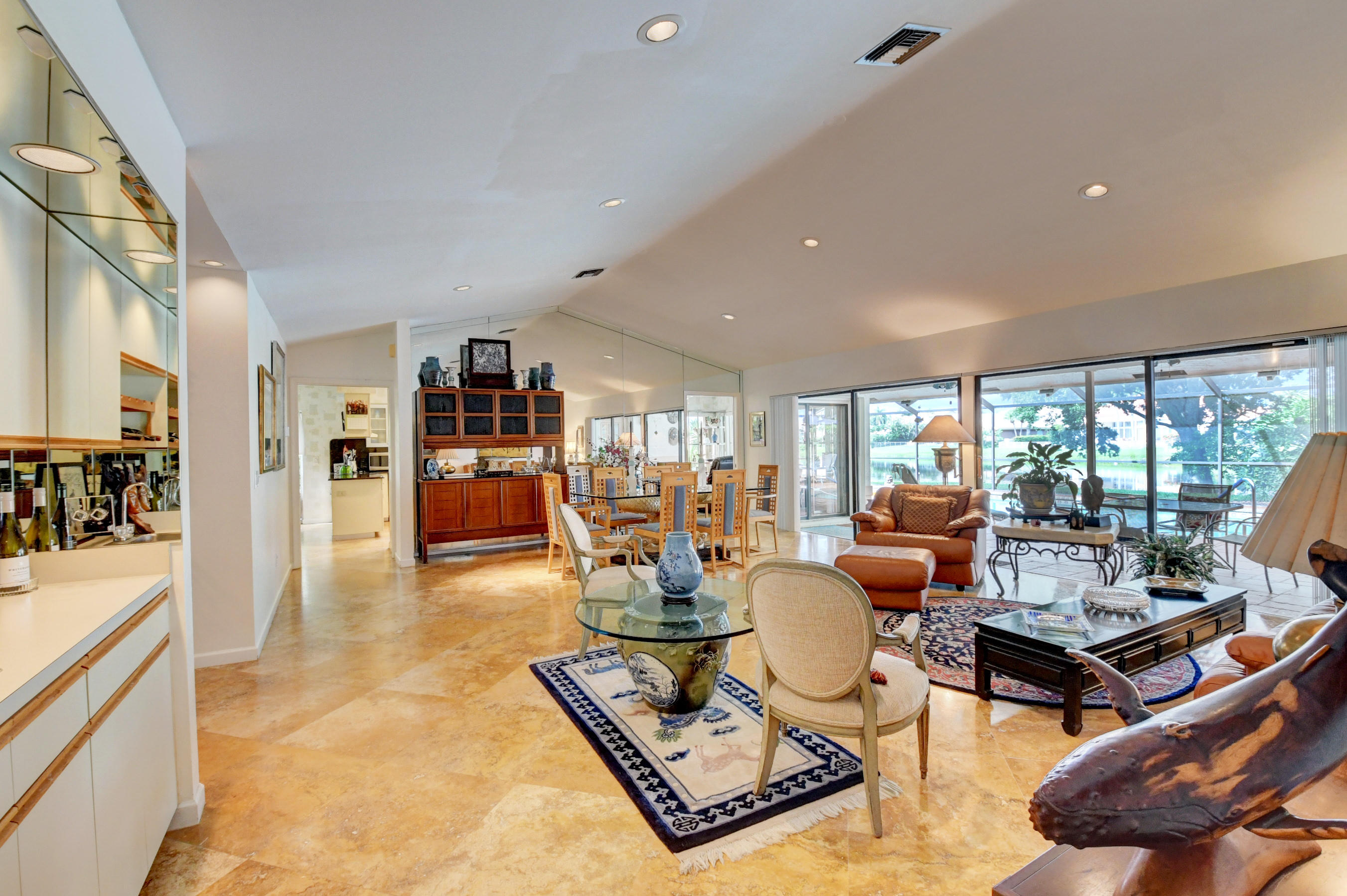 17331 Springtree Lane Boca Raton, FL 33487 - Photo 9 of 60 a living room with furniture and large window