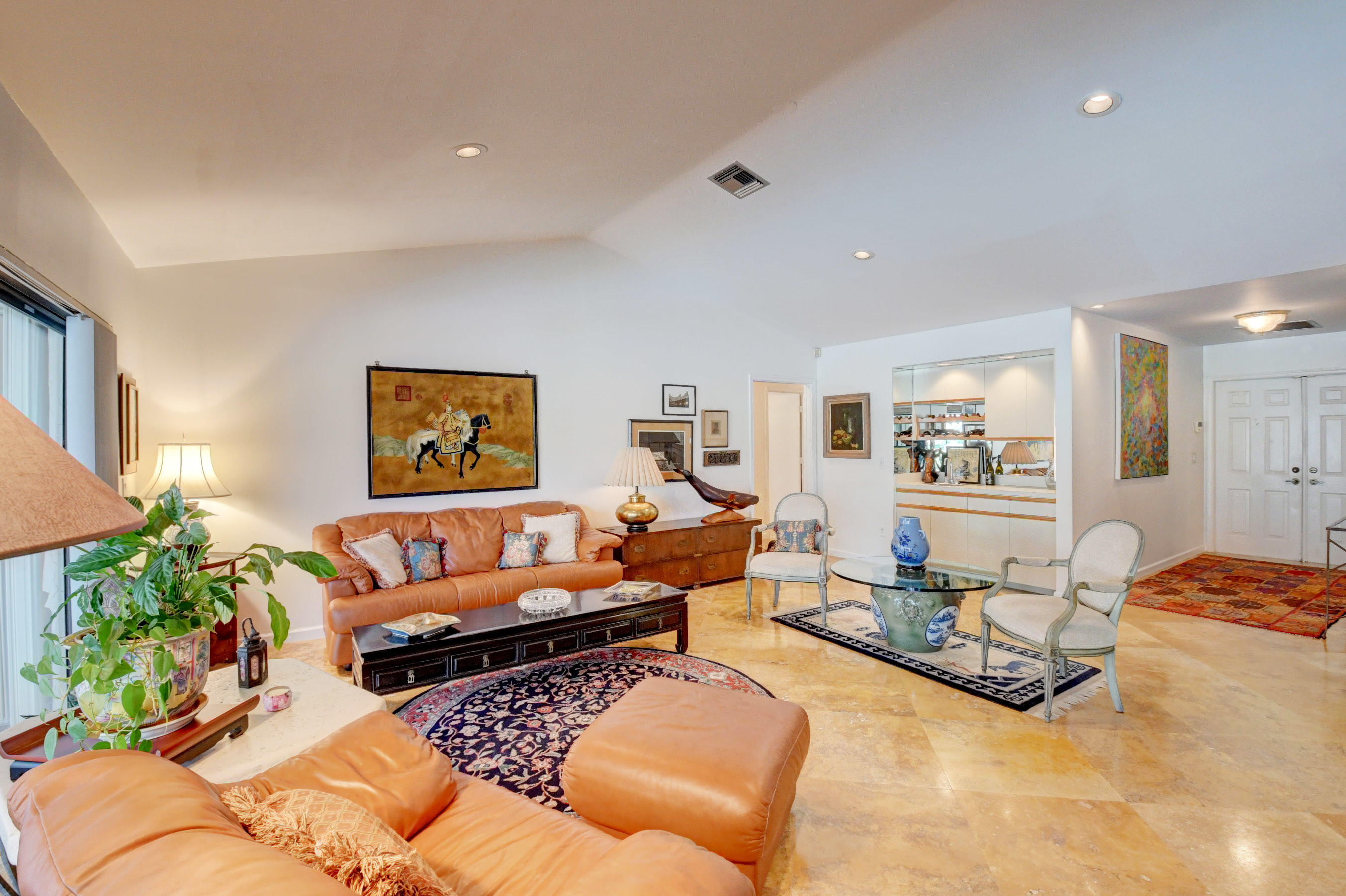 17331 Springtree Lane Boca Raton, FL 33487 - Photo 10 of 60 a living room with furniture and a couch