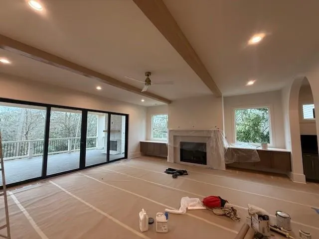 a room with furniture and a fireplace