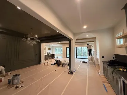 a room with gym equipment and a large window