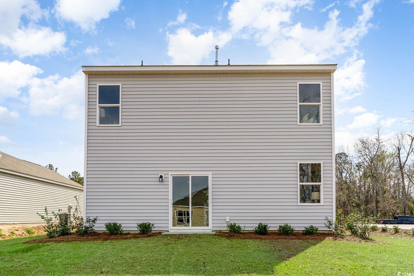 629 Anthem Court Conway, SC 29527 - Photo 2 of 40 Back of house featuring a yard