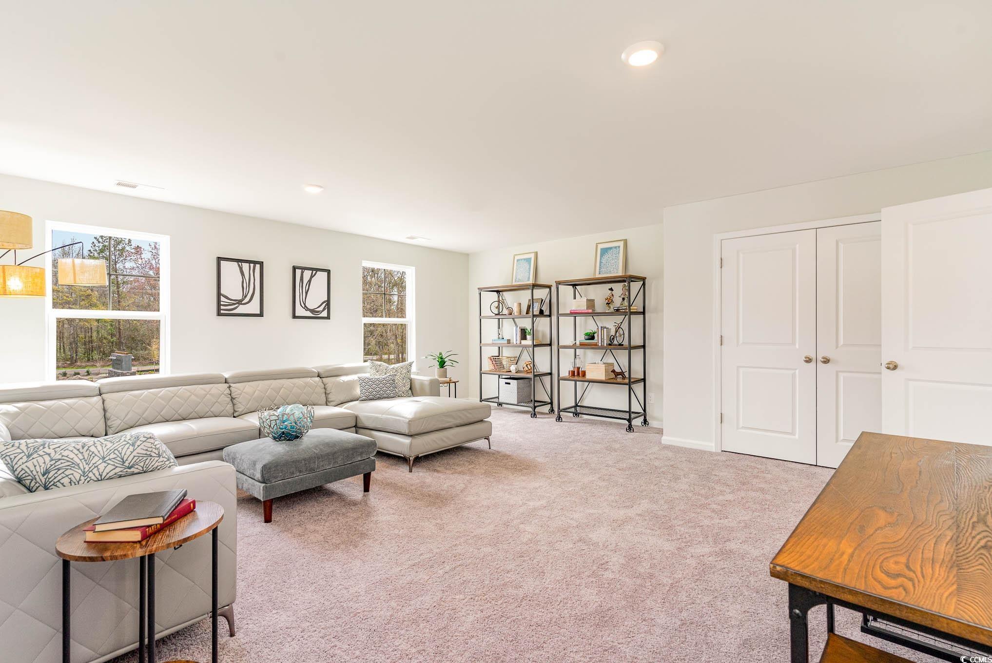 629 Anthem Court Conway, SC 29527 - Photo 34 of 40 Living area with plenty of natural light, light colored carpet, and recessed lighting