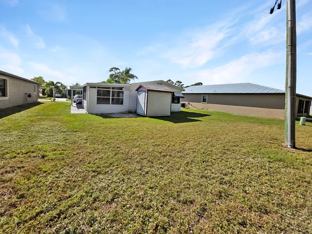 a house view with a garden space