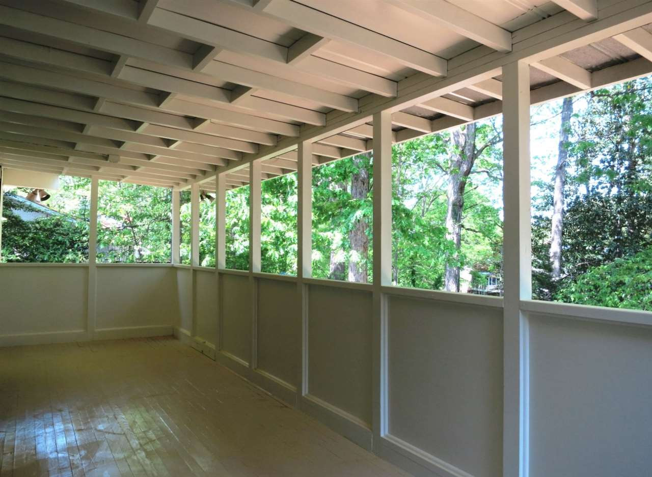 600 Davidson Street Raleigh, NC 27609 - Photo 5 of 25 The Screened Porch w/wood ceiling overlooks the private backyard. Screened Porch
