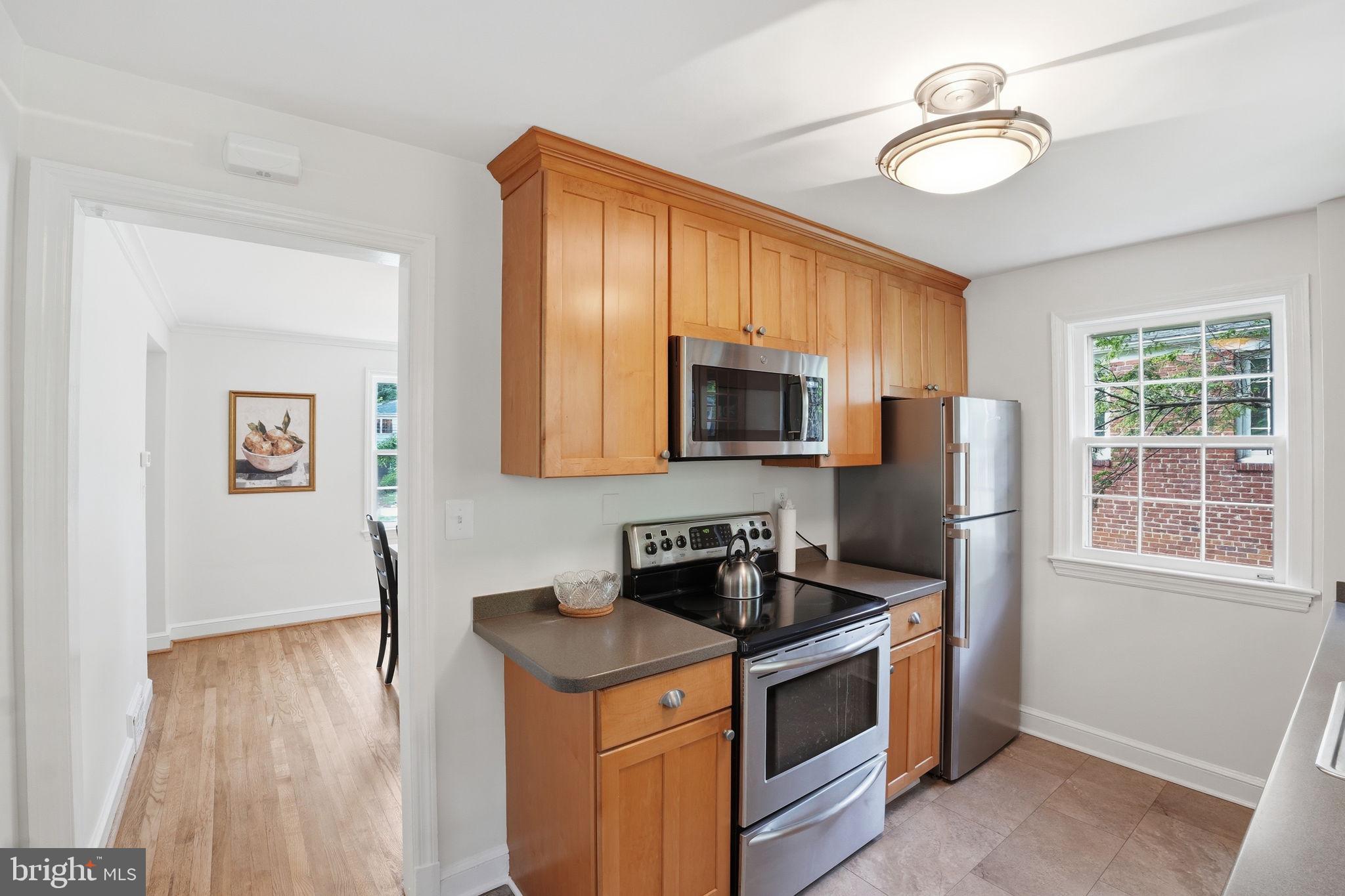 9601 Bruce Drive Silver Spring, MD 20901 - Photo 12 of 29 Charming kitchen with modern finishes.