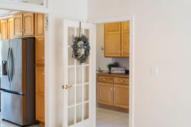 a bedroom with a bed and flat screen tv