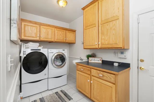 a white bath tub sitting in a bathroom