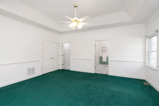 a view of a livingroom with wooden floor