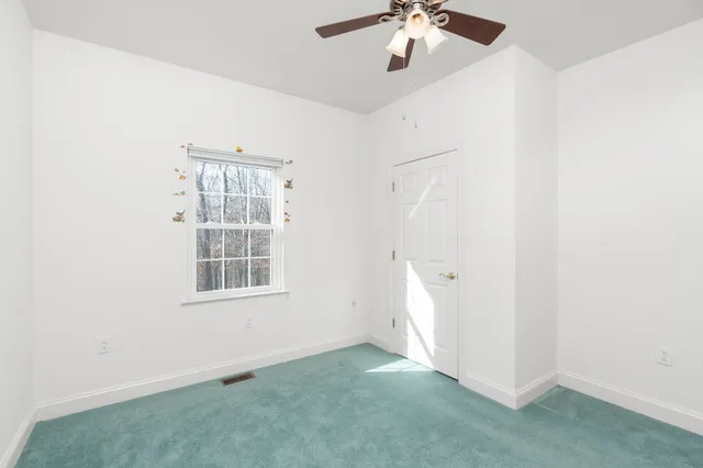 a view of a house with a big yard