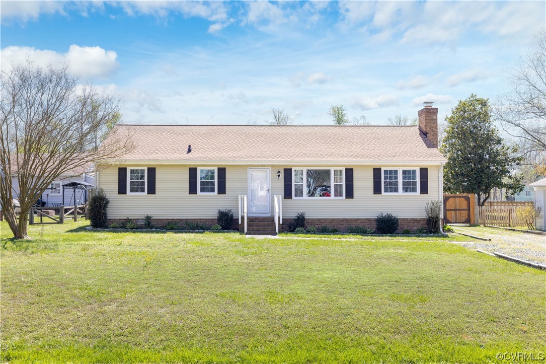 12107 Gardengate Road Midlothian, VA 23112 - Photo 1 of 22 a front view of a house with a yard