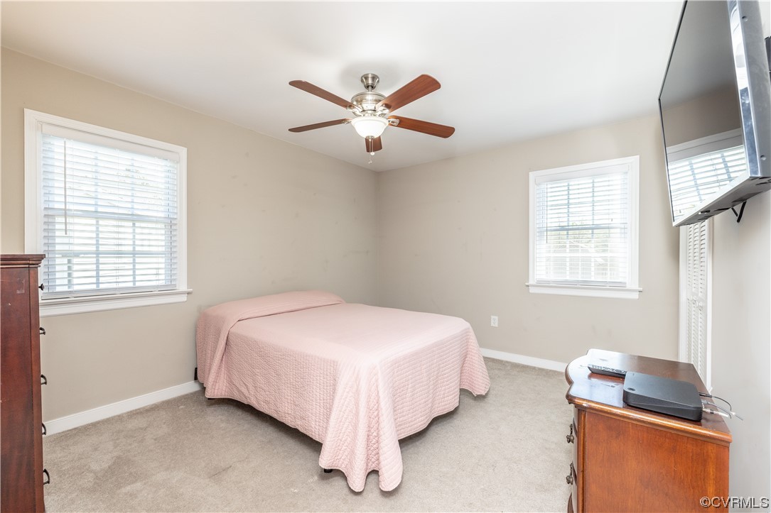 12107 Gardengate Road Midlothian, VA 23112 - Photo 14 of 22 a bedroom with a bed and a window