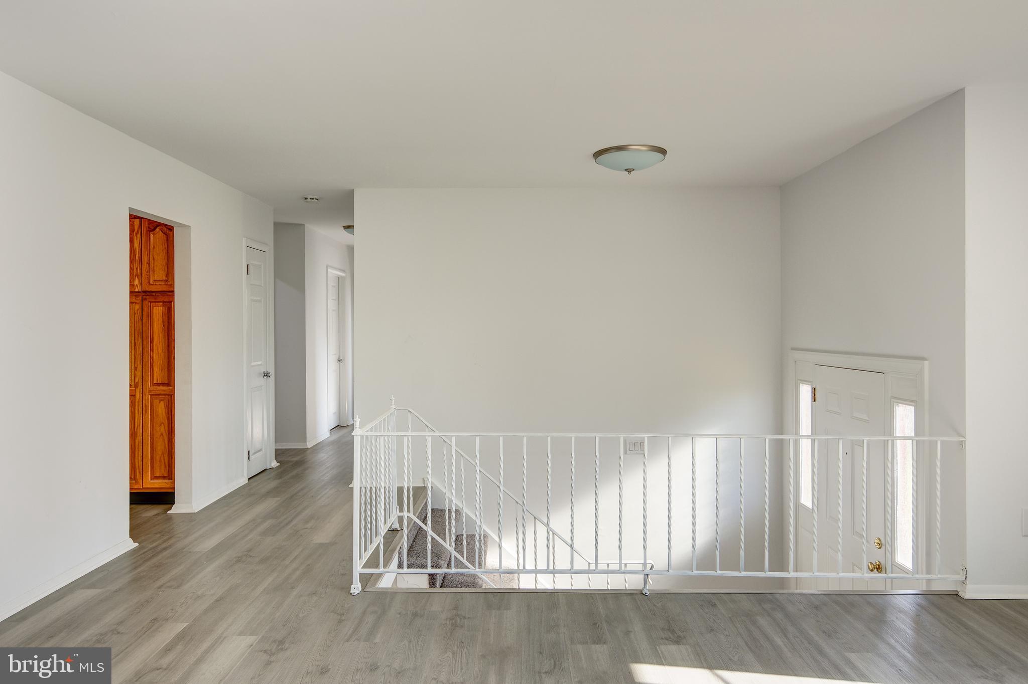 33 Rutgers Drive Delran, NJ 08075 - Photo 5 of 34 Newer Plank Laminate Flooring