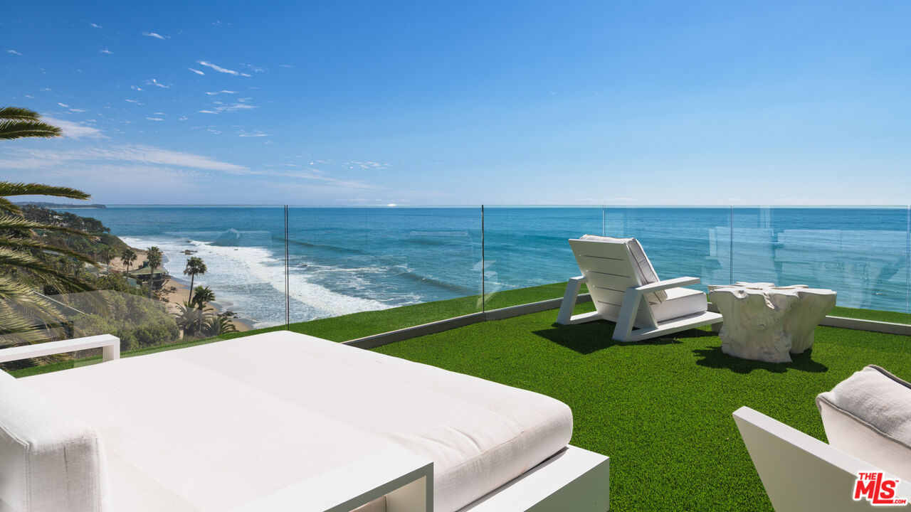 33406 Pacific Coast Highway Malibu, CA 90265 - Photo 33 of 51 a view of a two chairs in the garden