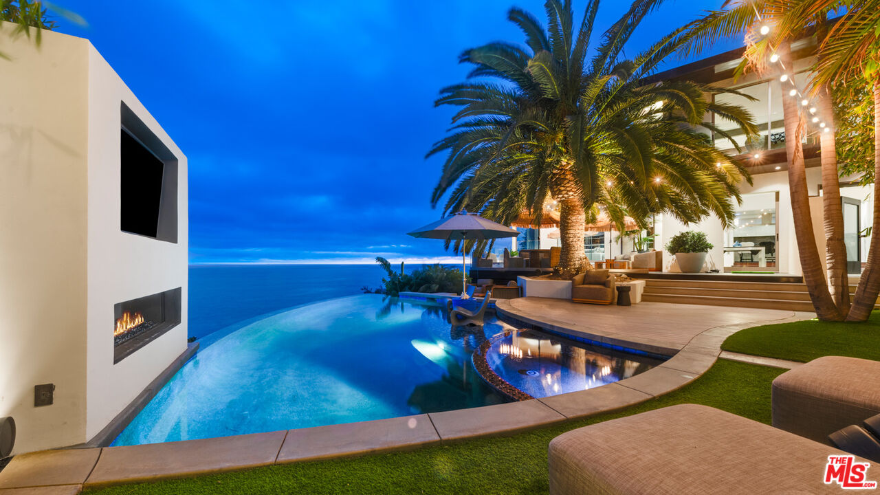 33406 Pacific Coast Highway Malibu, CA 90265 - Photo 44 of 51 a view of swimming pool with outdoor seating