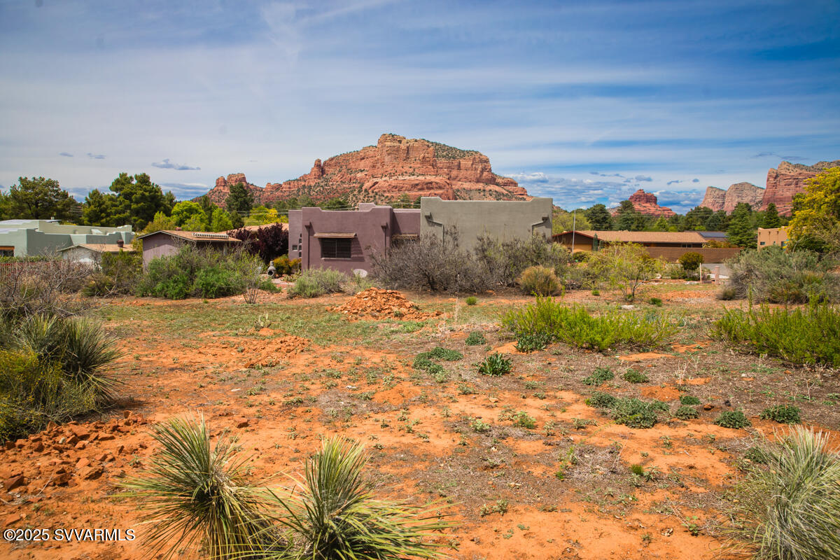 a view of a houses with a lake view
