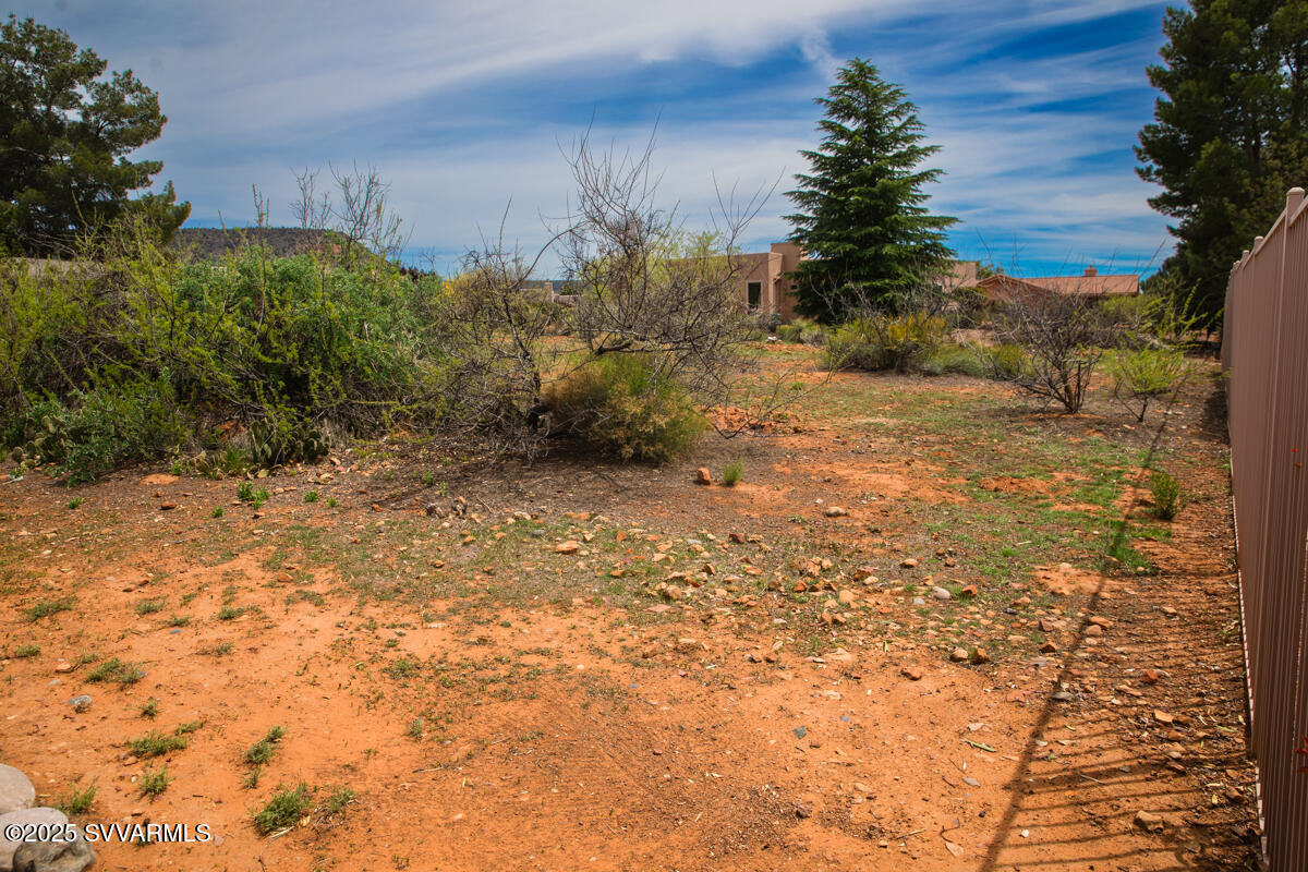 26 South House Rock Road, Unit 43 Sedona, AZ 86351 - Photo 6 of 15 a view of a yard with a tree