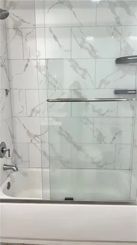 a bathroom with a bathtub