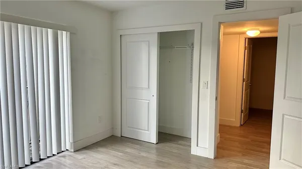a view of a bathroom from a hallway