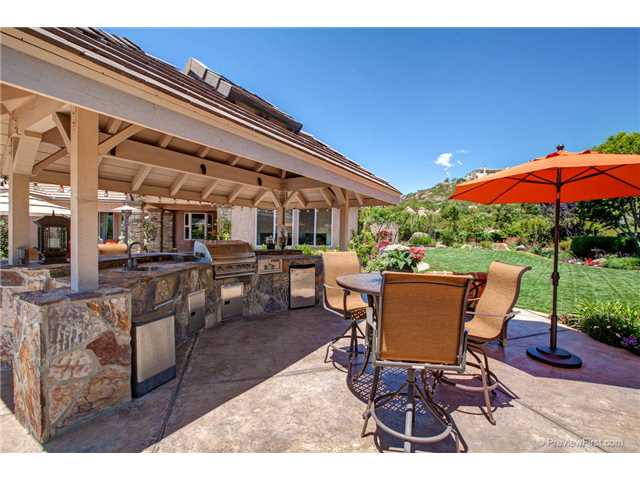 11178 Quail Canyon Road El Cajon, CA 92021 - Photo 20 of 25 COVERED OUTSIDE KITCHEN, IT EVEN HAS A LARGE OPEN ICE CHEST BUILT INTO THE COUNTER.