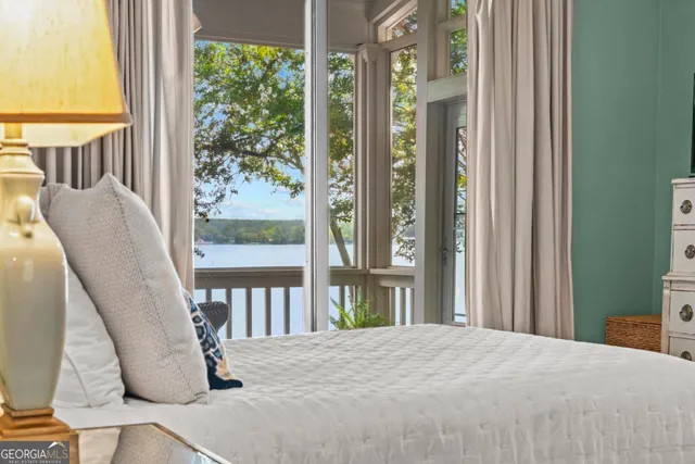 a view of a balcony with wooden floor