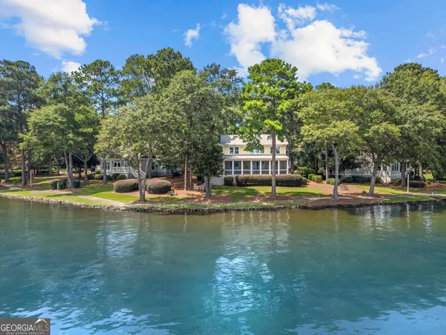 a view of a swimming pool with lake view