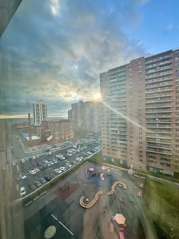 a kitchen with a stove a sink and a refrigerator