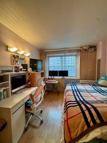 a view of a building with a yard