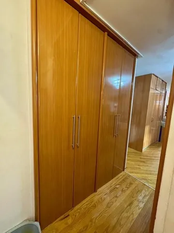 a living room with a couch and a flat screen tv