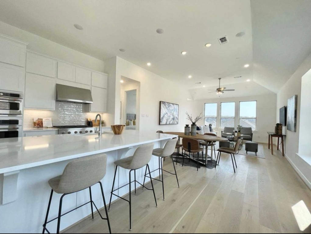 1116 Addison Lane Georgetown, TX 78628 - Photo 4 of 17 a living room with furniture and kitchen view