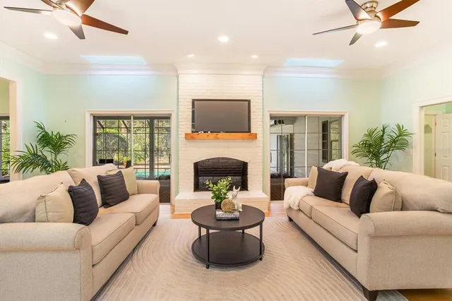 a view of a hallway view with wooden floor and furniture