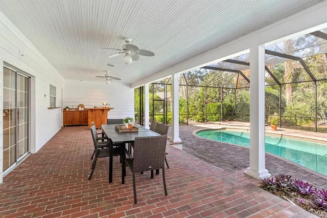 a kitchen with a sink and wooden cabinets