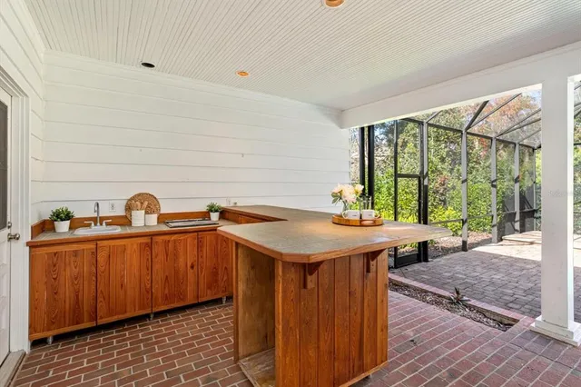 a bathroom with a sink and a window