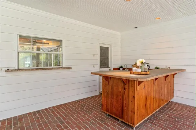 a view of a swimming pool with a yard