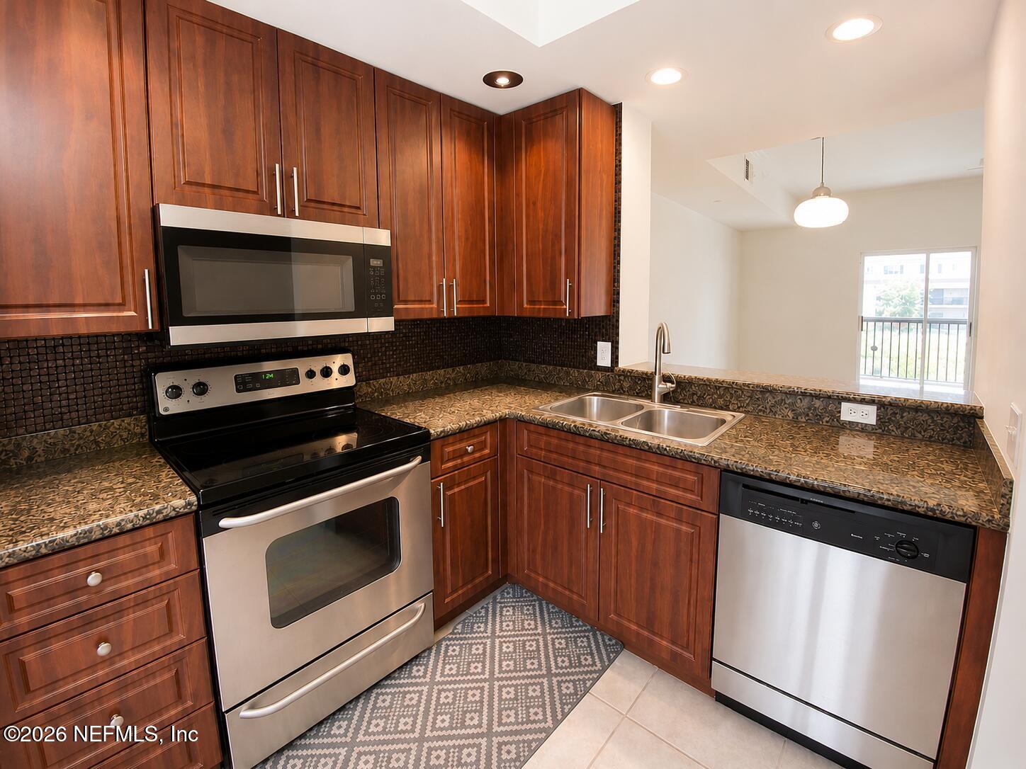 9745 Touchton Road, Unit 1822 Jacksonville, FL 32246 - Photo 2 of 21 Kitchen1